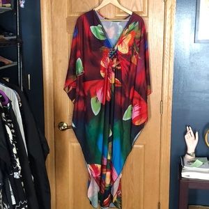 Tropical print, caftan maker, and size not listed.